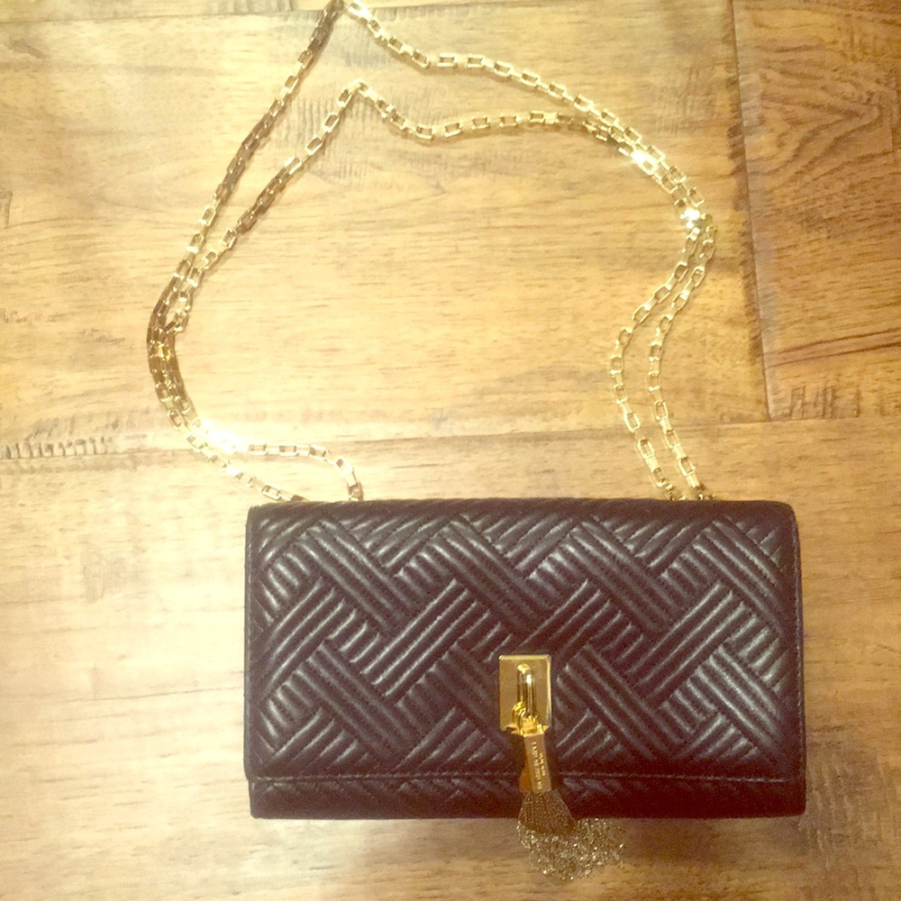 Henri bendel embossed wallet on a chain